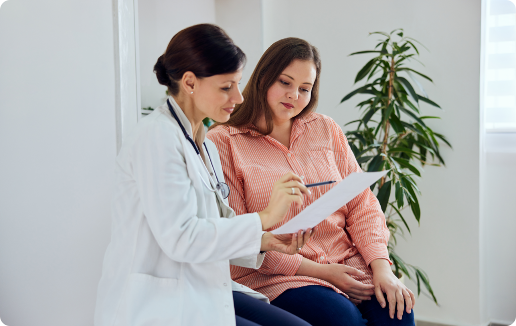Woman speaking to doctor